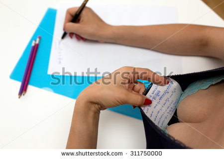 stock-photo-student-cheating-during-exam-311750000.jpg