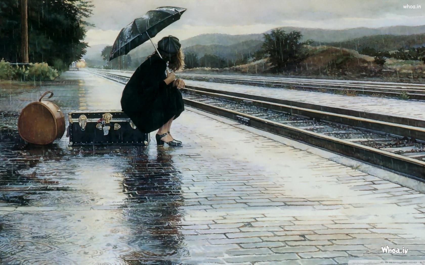 Alone-Girl-Sitting-On-a-Railway-Track.jpg
