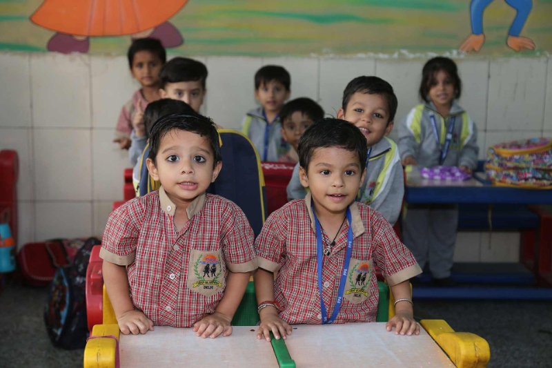 School in Kids Learning and playing in classroom